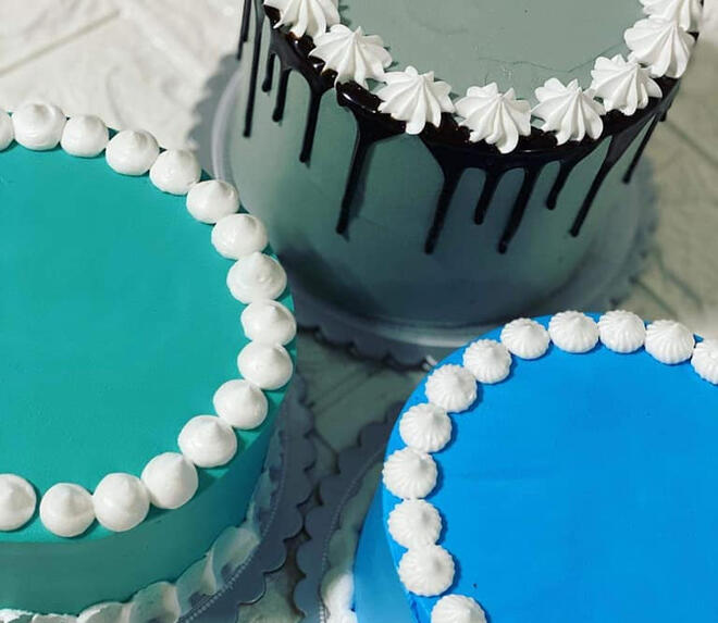 Icing cakes.
